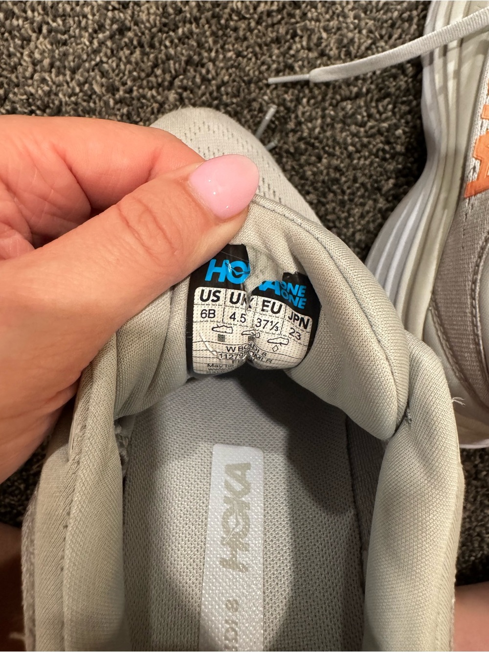 Hoka One One Lightweight Neutral Running Shoe - Light Gray with Orange Accent - Picture 2 of 4